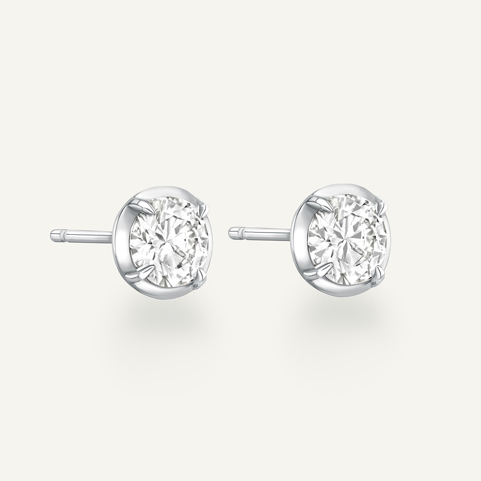 Round White Gold Bute Studs