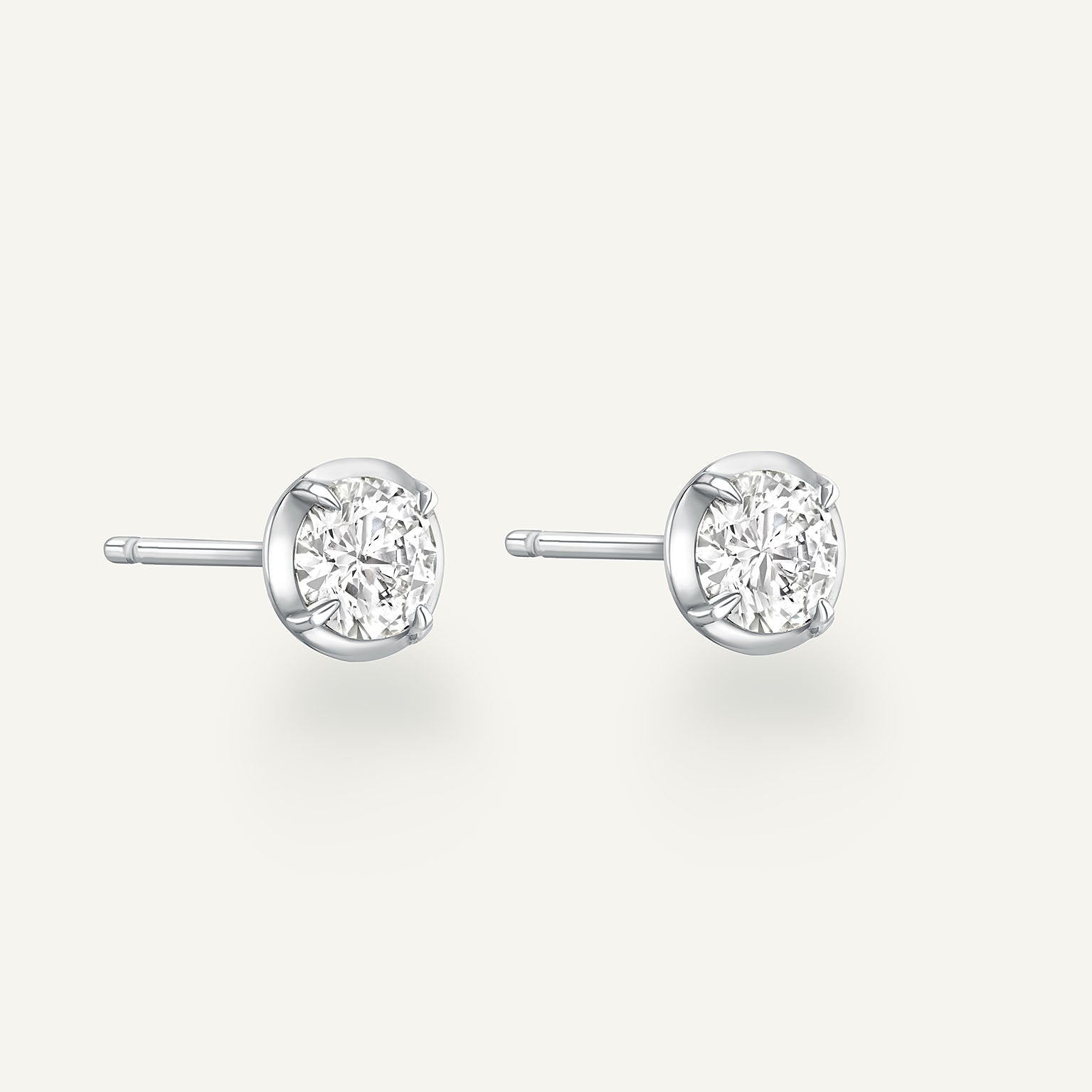 Round White Gold Bute Studs